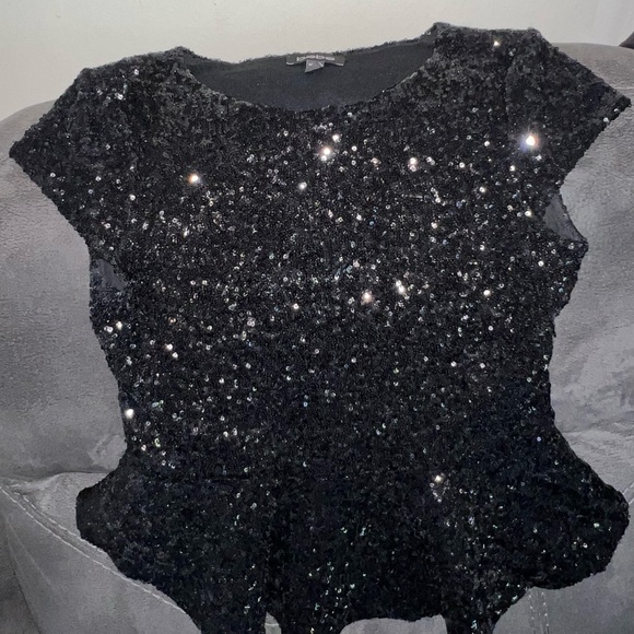 Beautiful black sequined blouse can be paired with a skirt or denim jeans. Bebe - Picture 2 of 6